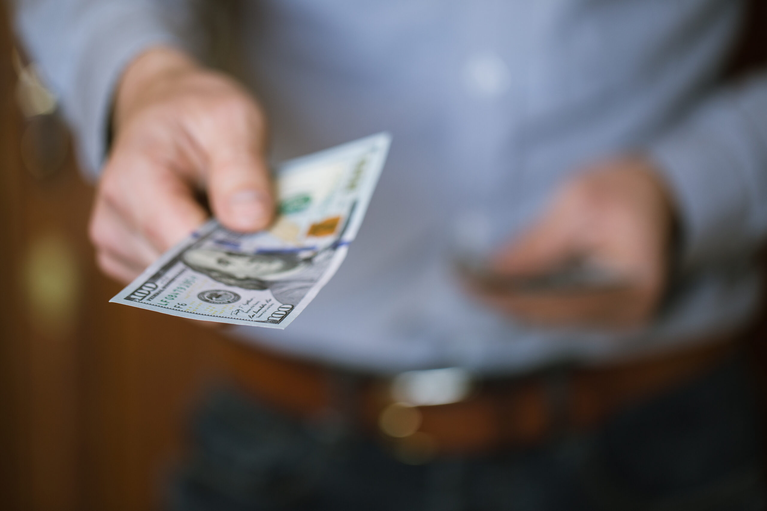 Businessman Holding Money In His Hands